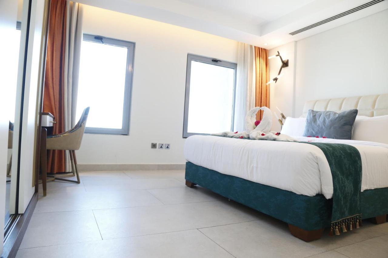Waterfront Hotel Apartment Lusail Exterior photo A room at the hotel