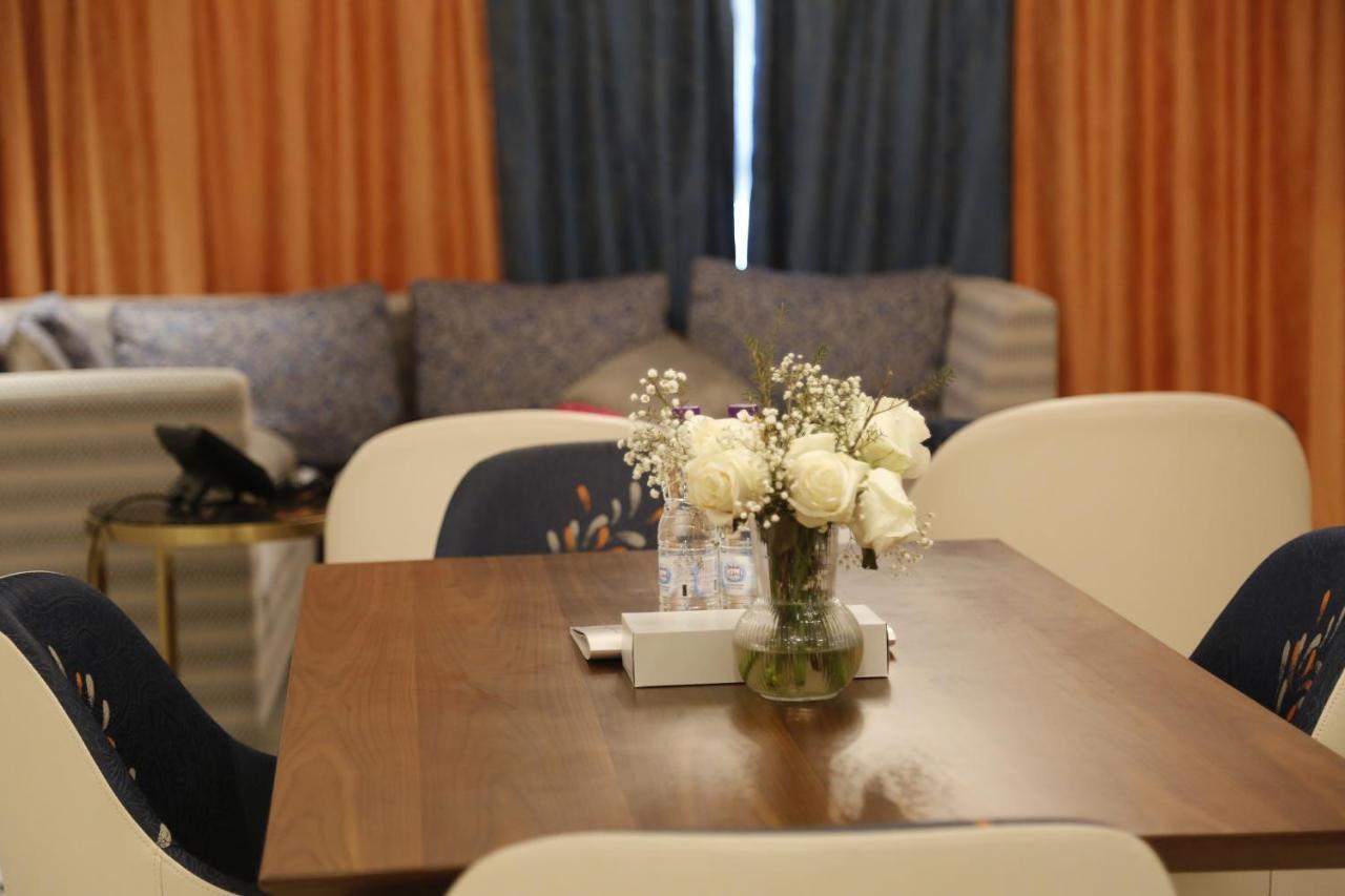 Waterfront Hotel Apartment Lusail Exterior photo A dining room in a house