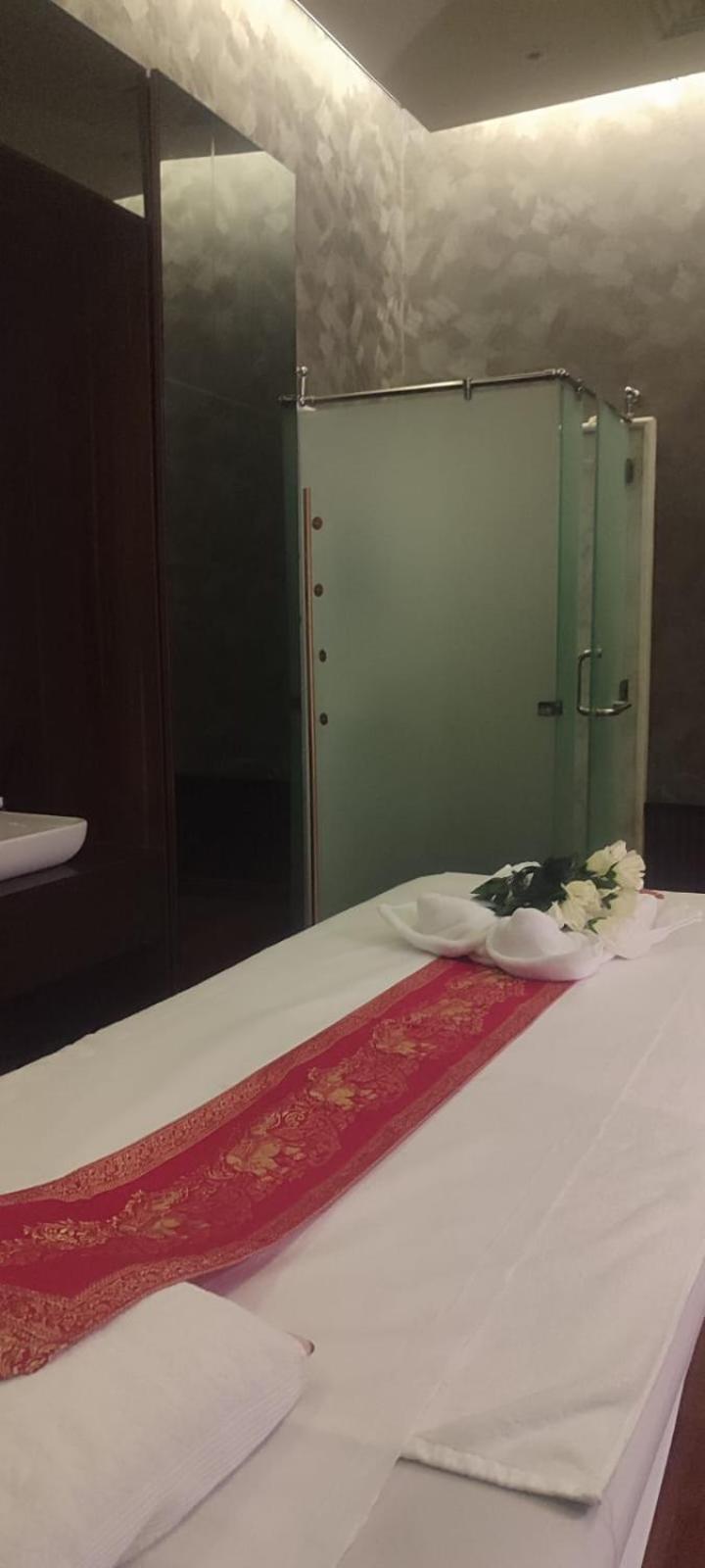 Waterfront Hotel Apartment Lusail Exterior photo A shower cubicle in a Thai spa